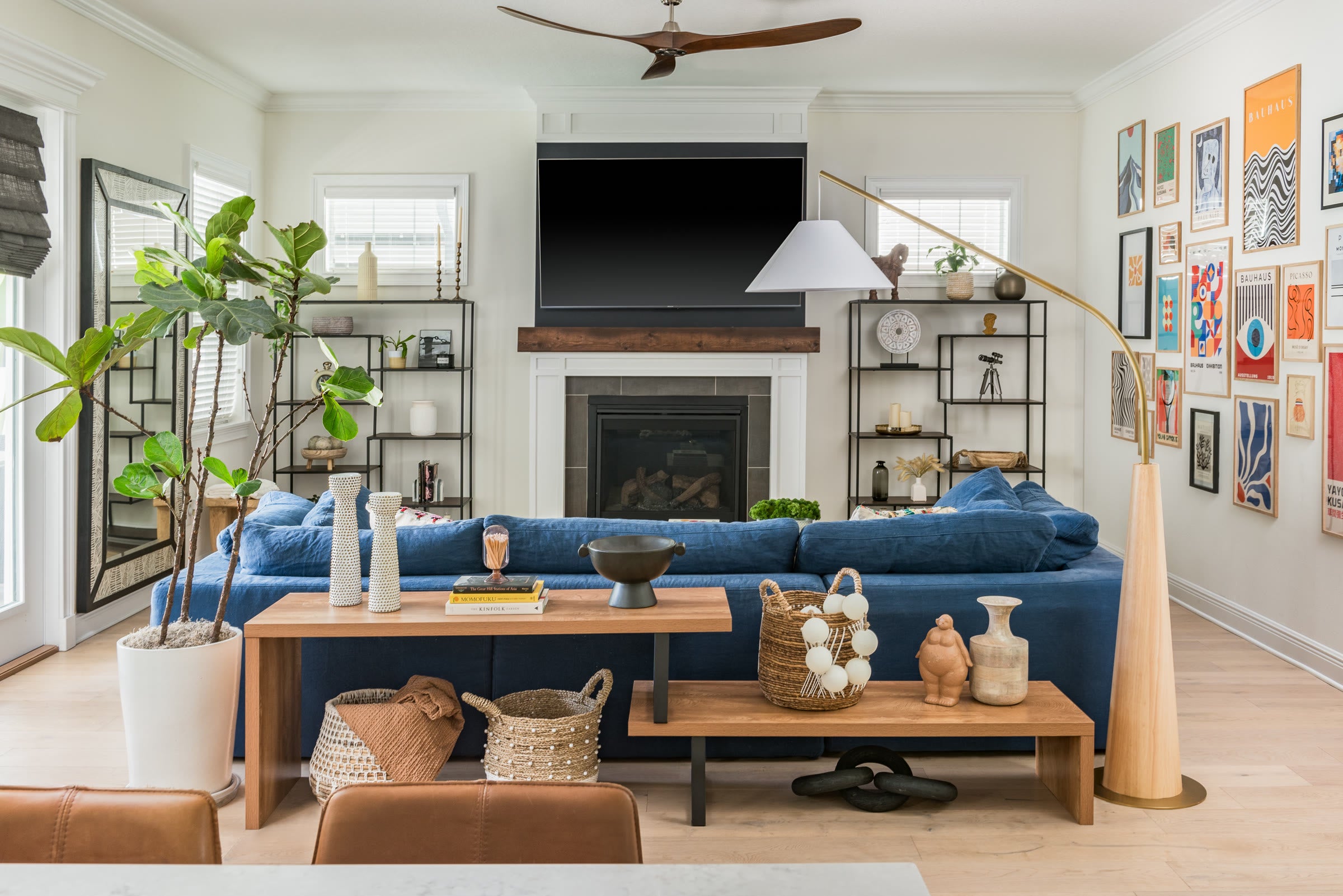 Layered living room designed by Sixth Sense Studio in Crescent Heights, St. Petersburg