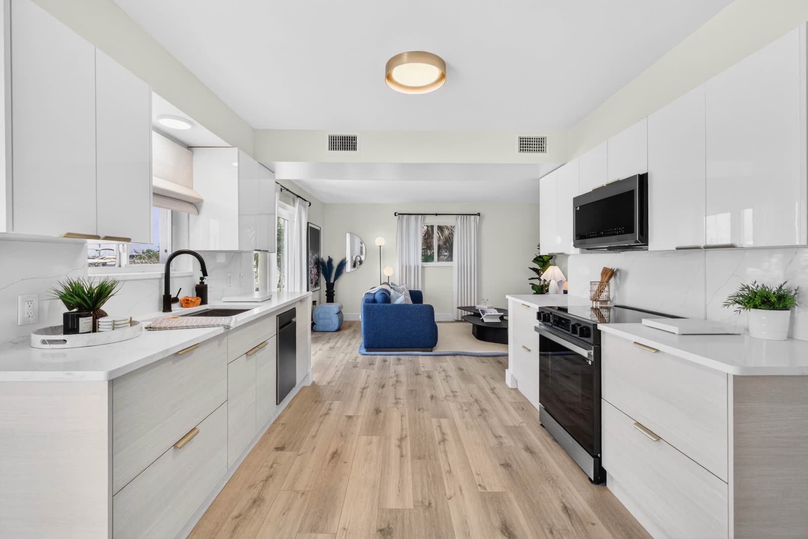 JW Residence reconstructed kitchen by Sixth Sense Studio in Clearwater